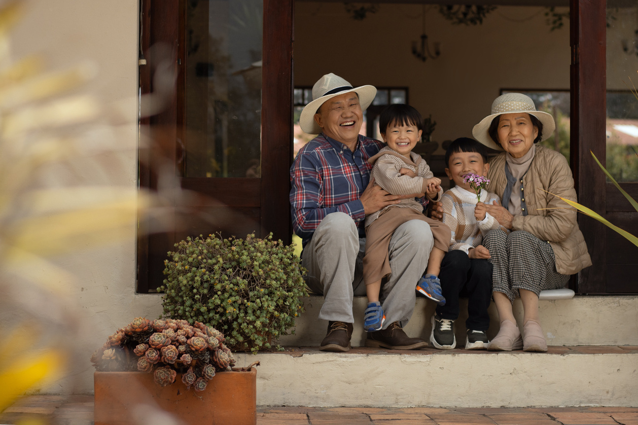 Grandparents Smiling with Grandchildren